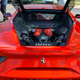 Animated Owner looked like Weird Al Yankovic and was decked out in Ferrari Gear as expected
